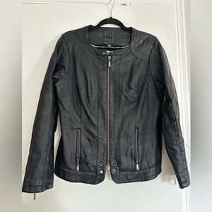 Odyn Women’s Black Vegan Leather  Moto Jacket. Quilted sides Metal Accents.